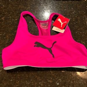 NWT Puma women’s medium sports bra. Gorgeous hot pink color.  Medium support.